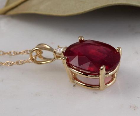 Buy 10 carats Natural ruby Grade 1 locket in silver with yellow gold coating