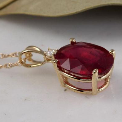 Buy 10 carats Natural ruby Grade 1 locket in silver with yellow gold coating