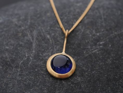 Buy blue sapphire, silver locket with gold coating, female